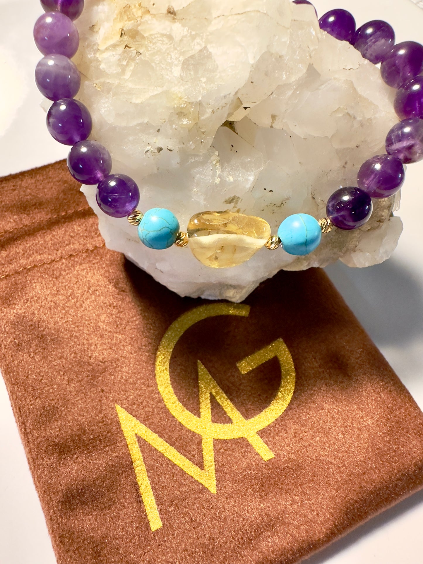 سوار من الجمشت والسيترين والفيروز (21 قيراط)