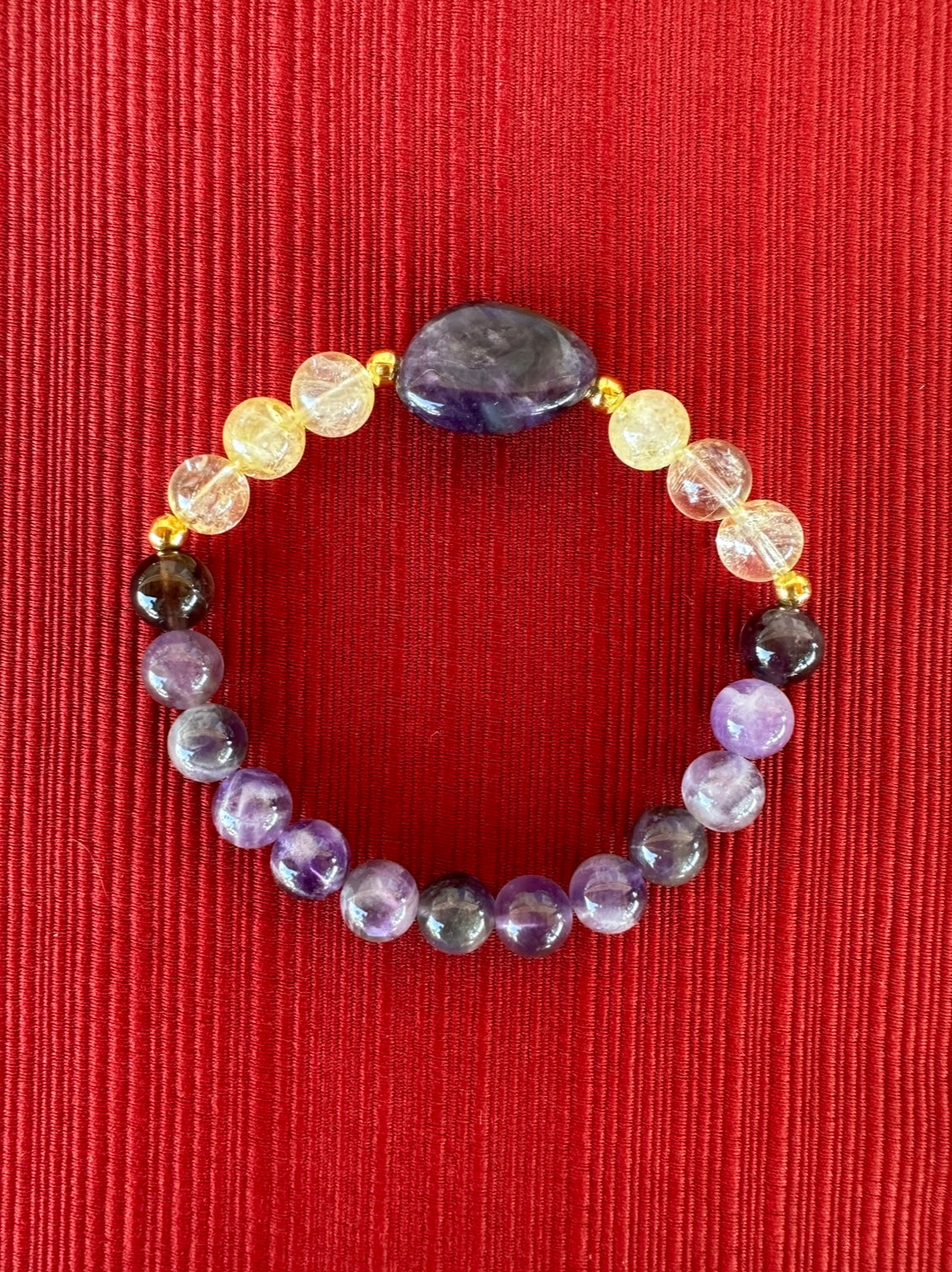 سوار من حجر الجمشت والسيترين