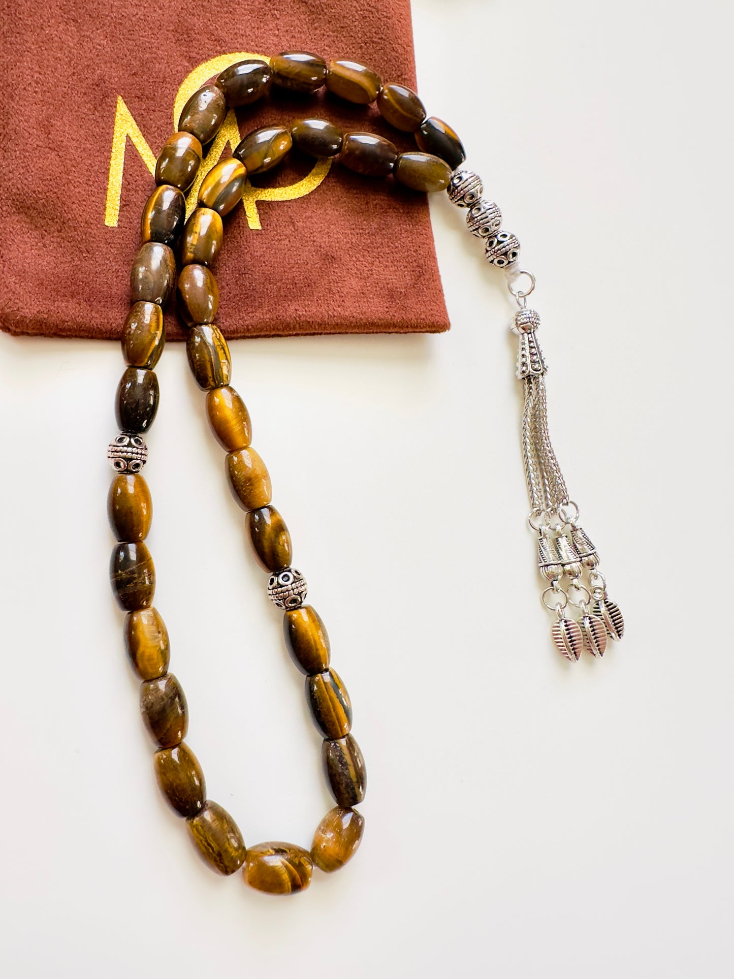 مسبحة تصميم رجالي ٣٣ حبة من حجر عين النمر الطبيعي الشكل الاسطواني