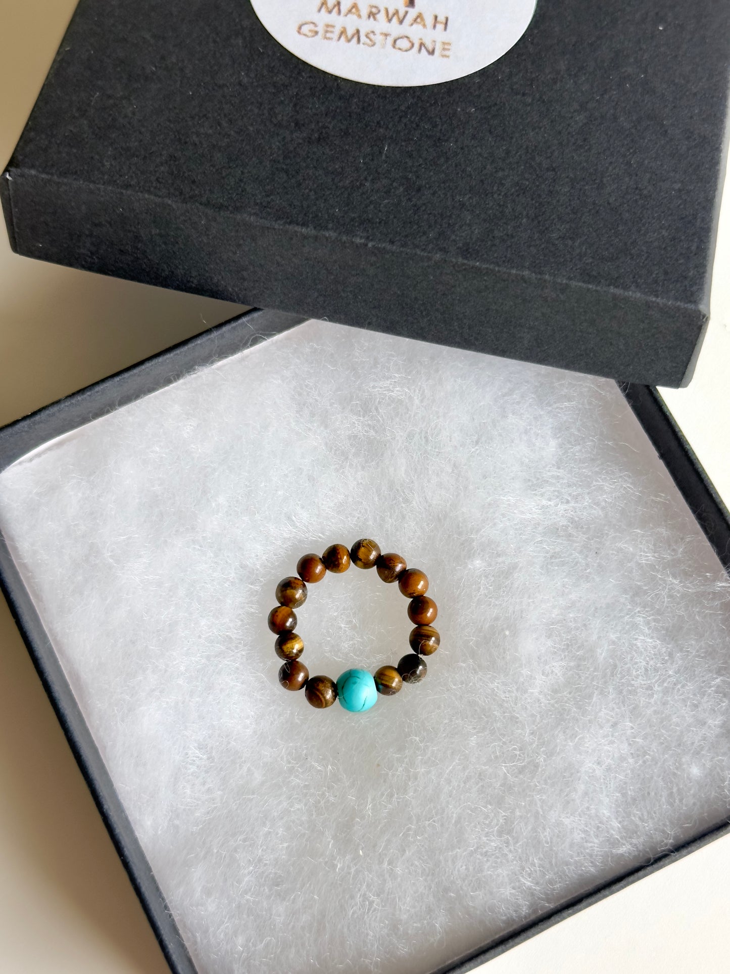 Turquoise and Tiger eye Rings