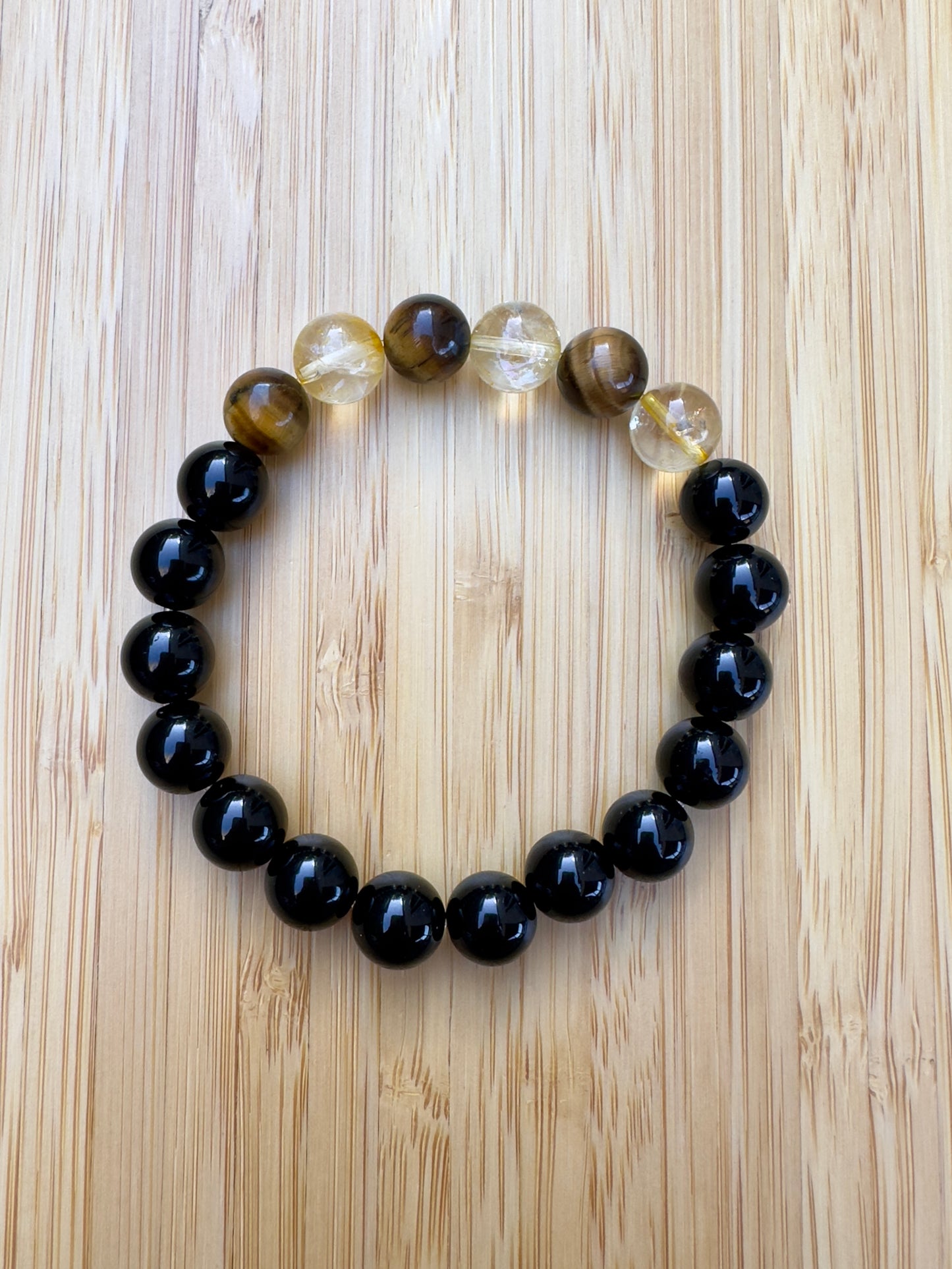 سوار رجالي من العقيق الأسود وعين النمر والسيترين