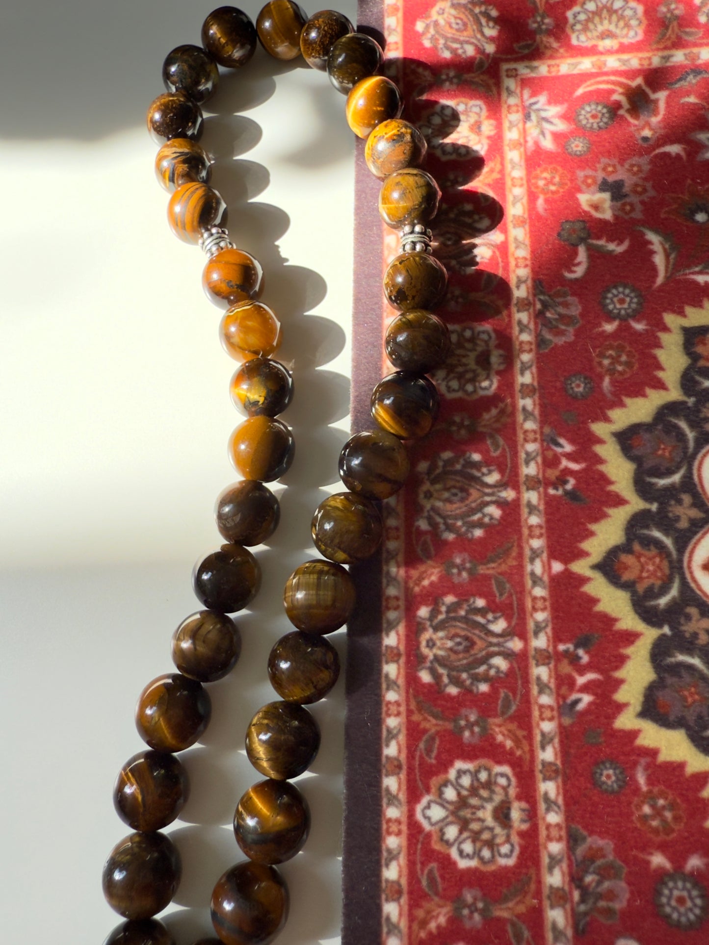 Tiger Eye 33-Bead Misbaha 10mm Bead Size With Silver