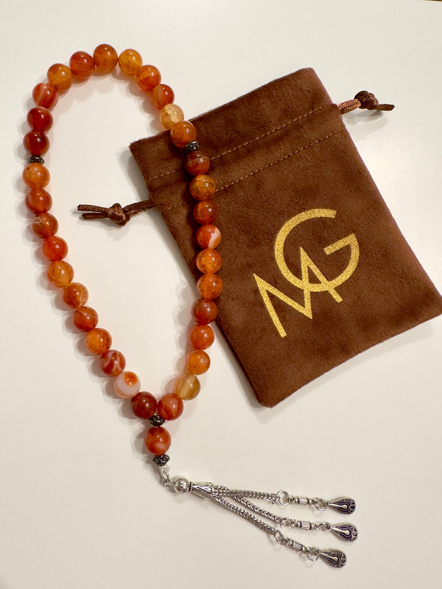 مسبحة من العقيق الناري مكونة من 33 حبة