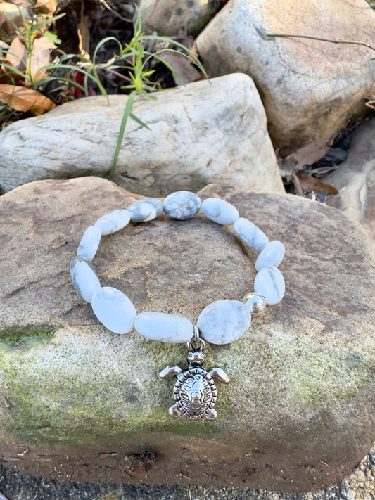 Oval-Shaped Howlite Bracelet With Silver Plated Turtle Charm